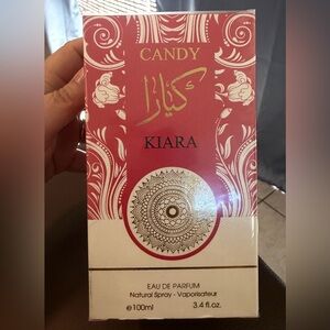 Kiara Candy Women’s Spray- Pink Gold Accents NWT wrapped in plastic packaging